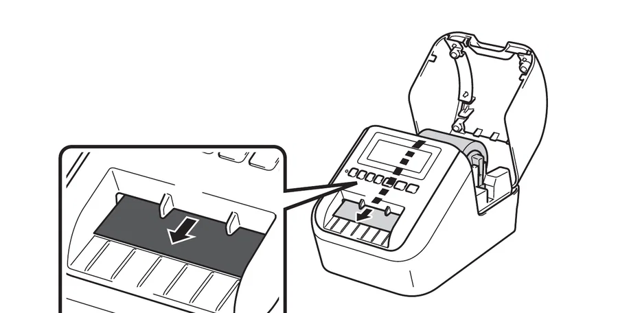 Threading the DK roll through the label output slot