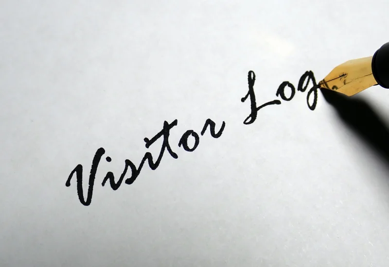 paper visitor log pen paper