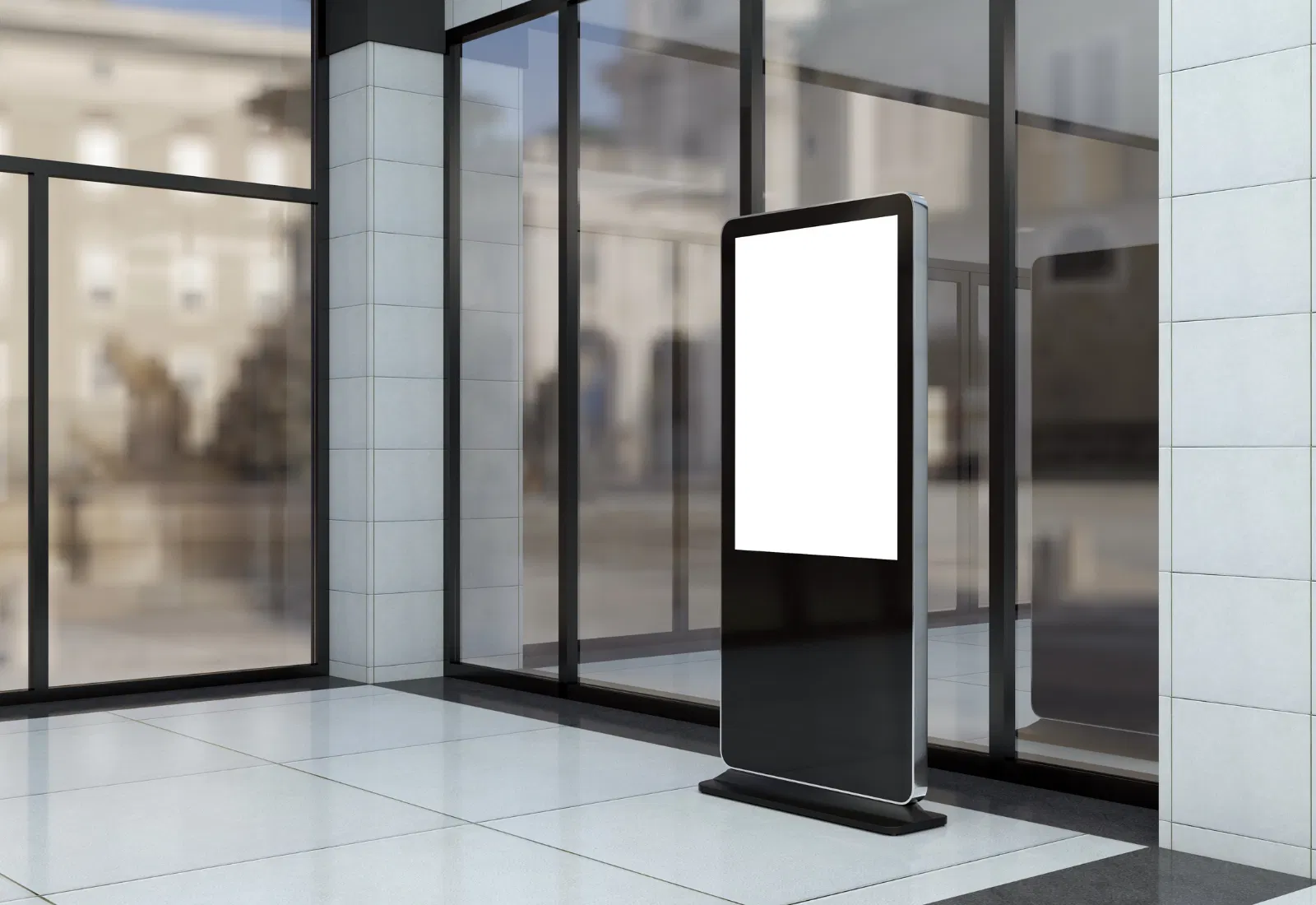 Freestanding digital kiosk in a modern office lobby, used as a virtual welcome screen at the reception desk.